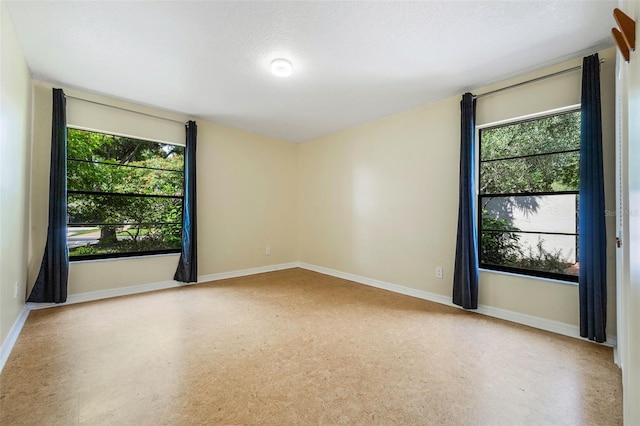 7755 High Pine Rd, Orlando, FL 32819 - spare room with baseboards