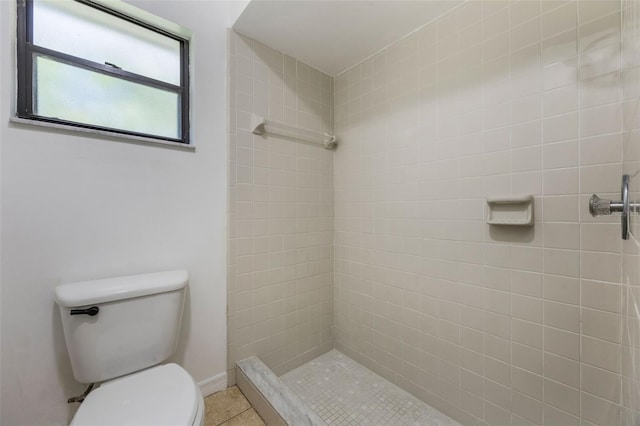 7755 High Pine Rd, Orlando, FL 32819 - full bathroom with a tile shower and tile patterned floors