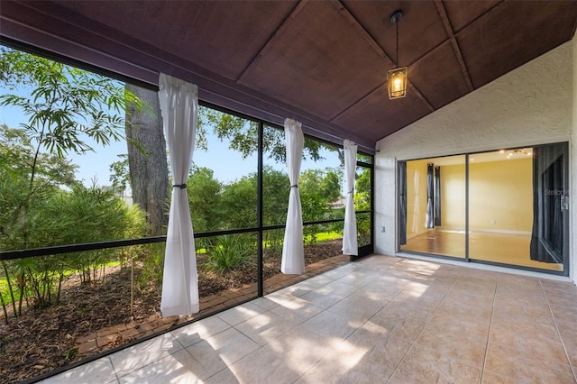 7755 High Pine Rd, Orlando, FL 32819 - unfurnished sunroom with vaulted ceiling and wooden ceiling