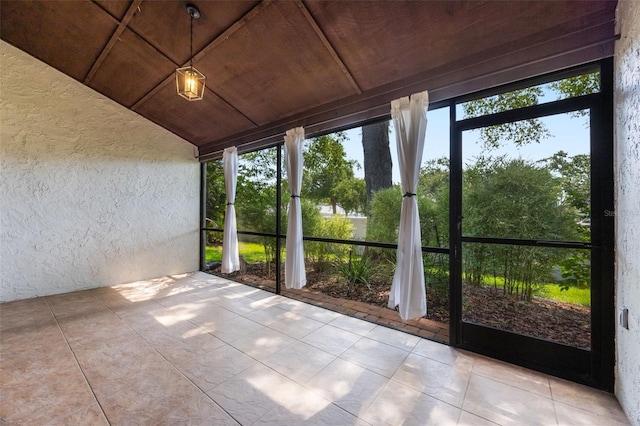 7755 High Pine Rd, Orlando, FL 32819 - unfurnished sunroom featuring lofted ceiling