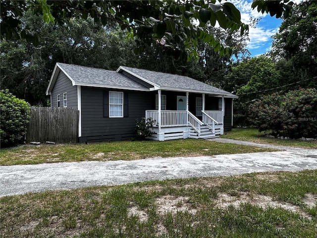 3304 Dew Berry Ave, Apopka, FL 32712 - ranch-style home featuring covered porch and a shingled roof