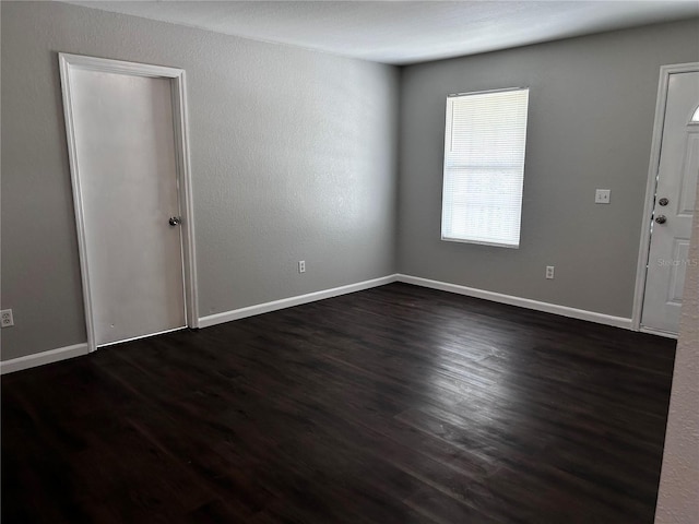 3304 Dew Berry Ave, Apopka, FL 32712 - spare room featuring dark wood-type flooring and baseboards
