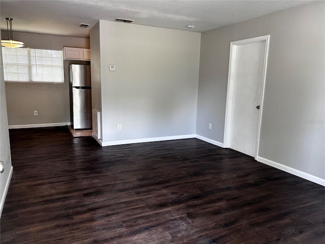 3304 Dew Berry Ave, Apopka, FL 32712 - spare room featuring baseboards and dark wood-style floors