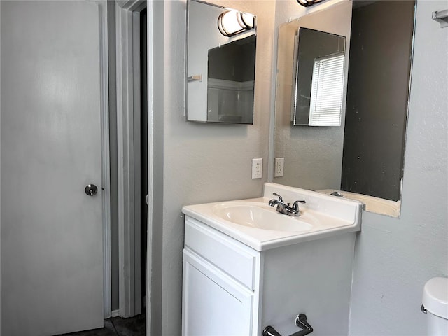3304 Dew Berry Ave, Apopka, FL 32712 - bathroom featuring vanity and a textured wall
