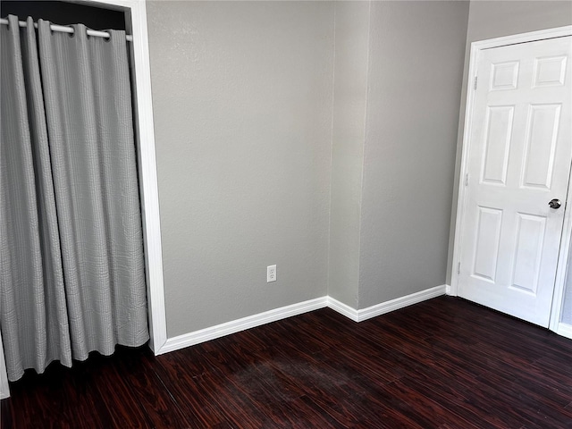3304 Dew Berry Ave, Apopka, FL 32712 - spare room featuring dark wood-type flooring and baseboards