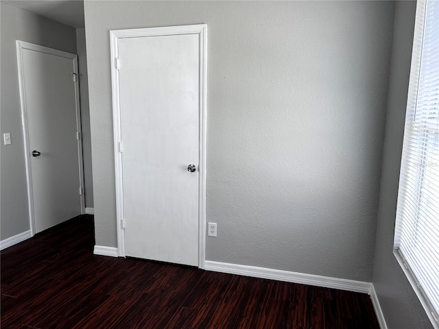 3304 Dew Berry Ave, Apopka, FL 32712 - spare room featuring dark wood-style flooring and baseboards