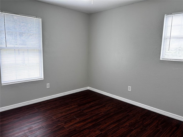 3304 Dew Berry Ave, Apopka, FL 32712 - unfurnished room featuring dark wood-type flooring and baseboards