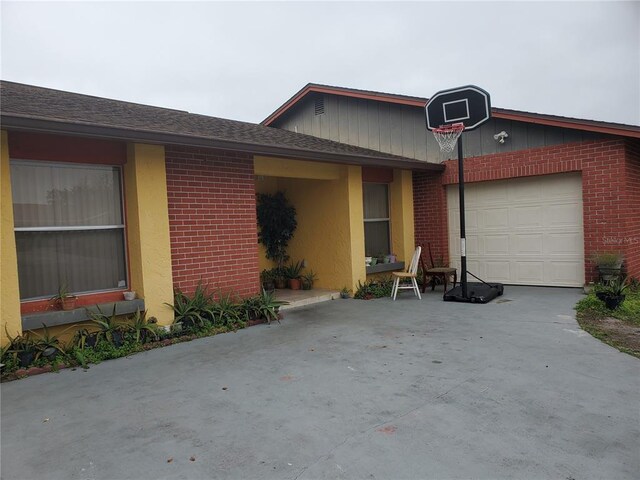 view of front of property with a garage