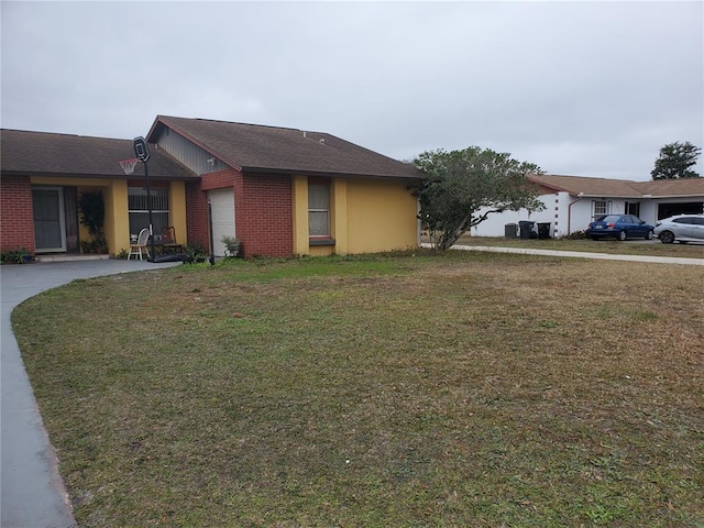 ranch-style home with a front lawn