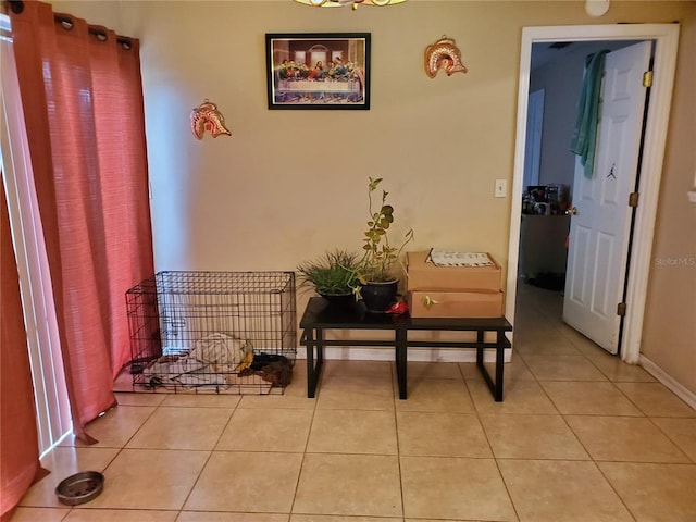 sitting room with light tile floors