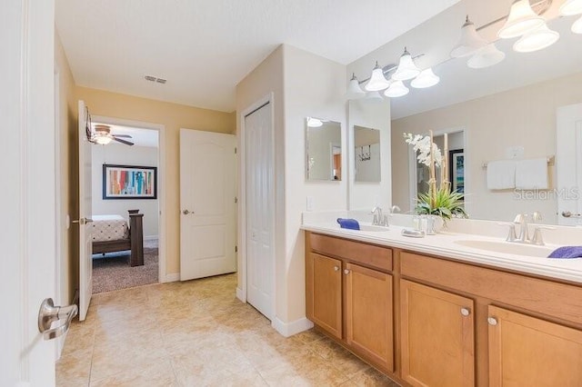 bathroom with vanity and ceiling fan