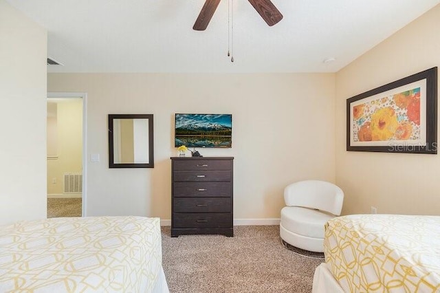 bedroom with light carpet and ceiling fan