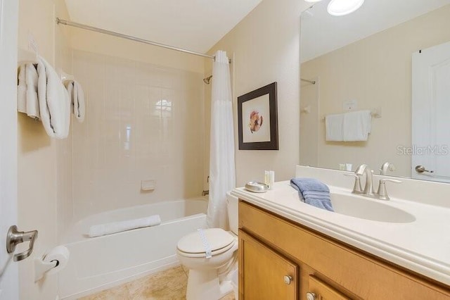 full bathroom with shower / tub combo with curtain, vanity, toilet, and tile patterned floors