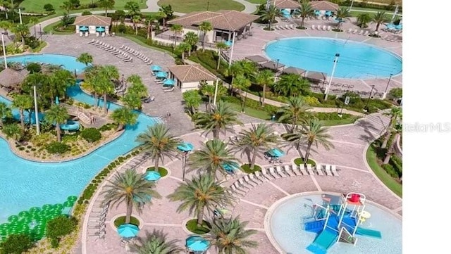 view of swimming pool featuring a patio