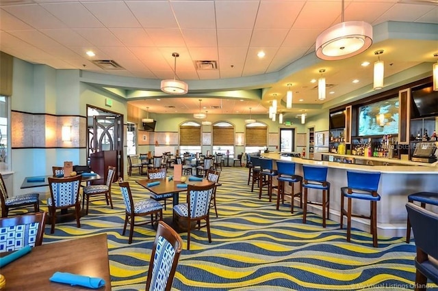 view of carpeted dining space