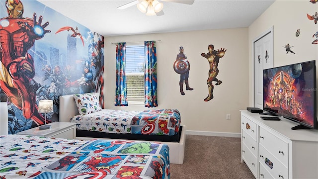 carpeted bedroom featuring ceiling fan