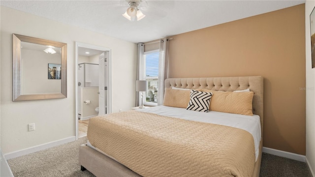 bedroom with connected bathroom and light carpet