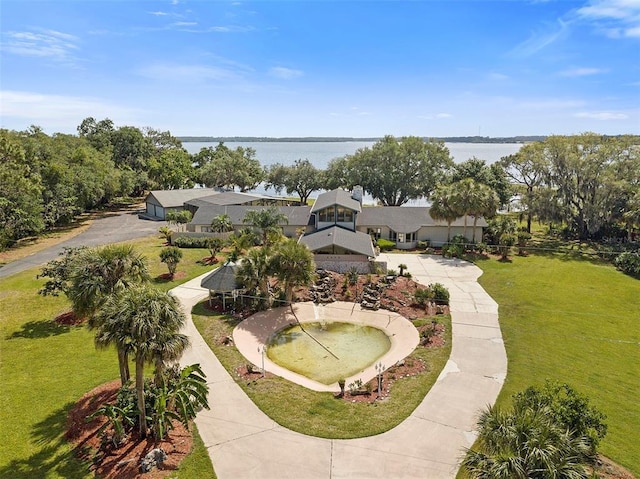 drone / aerial view with a water view