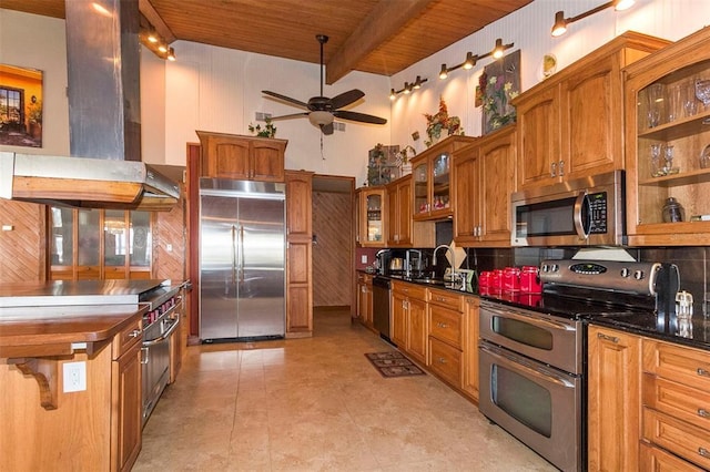 kitchen featuring ceiling fan, appliances with stainless steel finishes, beam ceiling, wood ceiling, and island exhaust hood