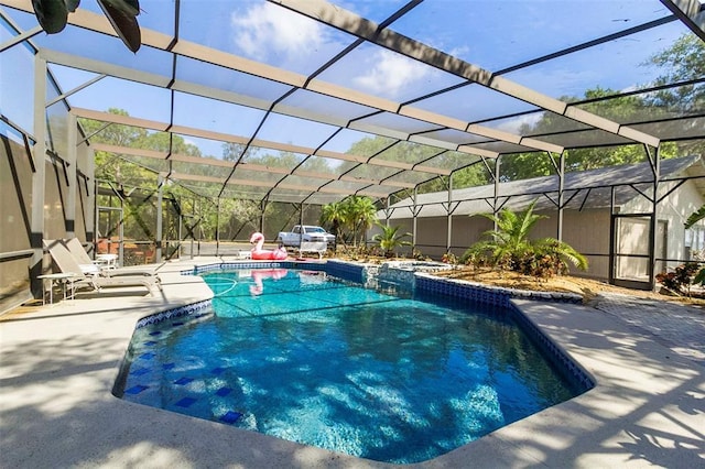 view of pool featuring a patio area and a lanai