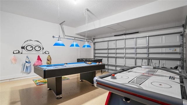 playroom with a textured ceiling