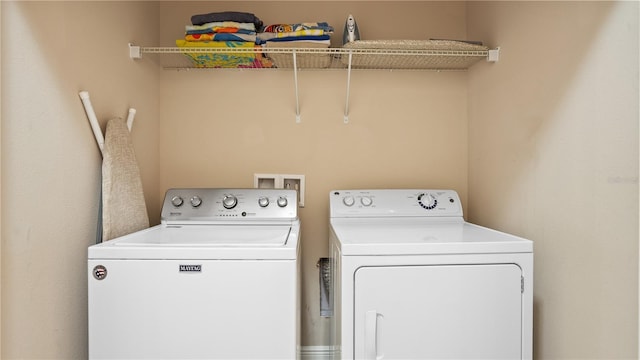 laundry room with washer and dryer