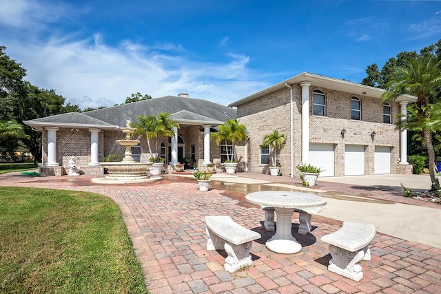 view of front of property featuring a garage