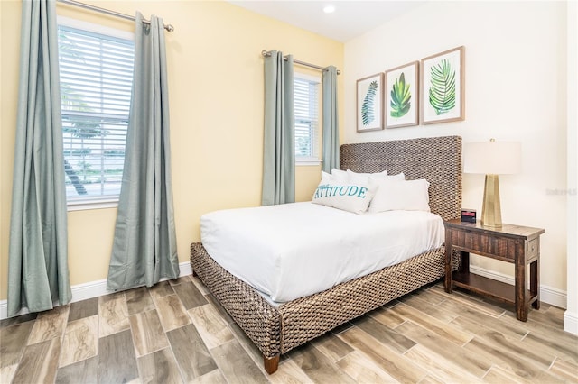 bedroom featuring multiple windows