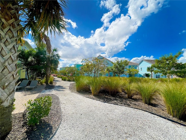 view of property's community featuring a patio