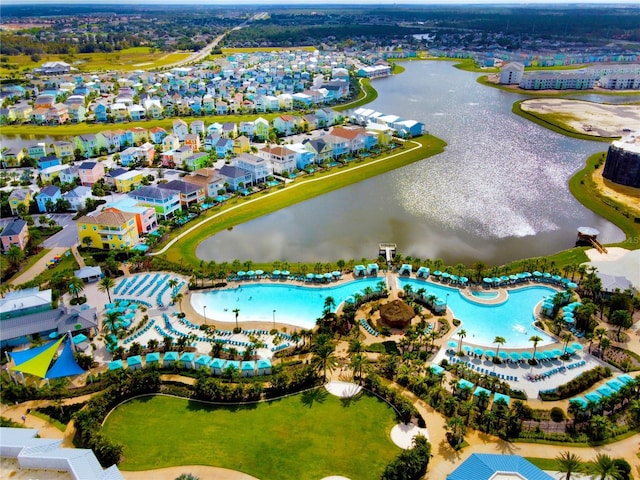 birds eye view of property featuring a water view