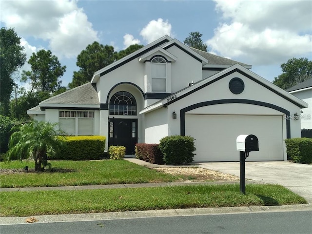 view of front of house with a garage