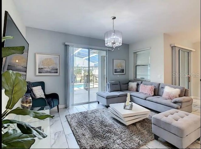 living room with a notable chandelier