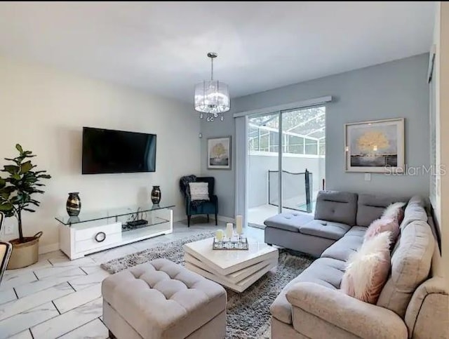 living room featuring a notable chandelier