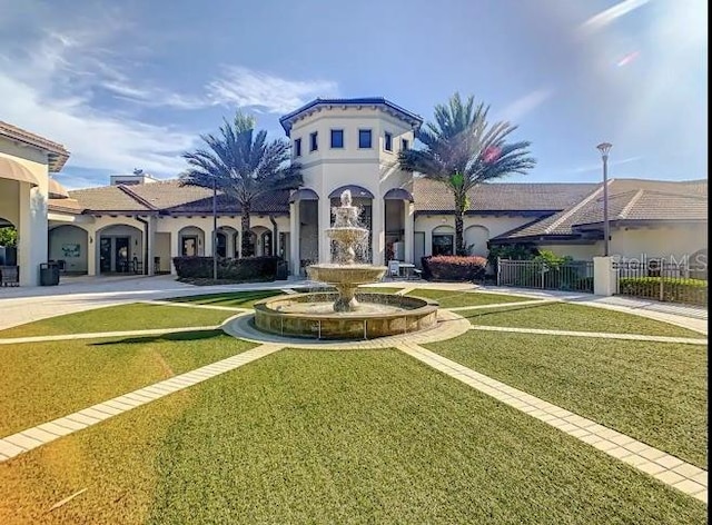 view of front facade with a front yard