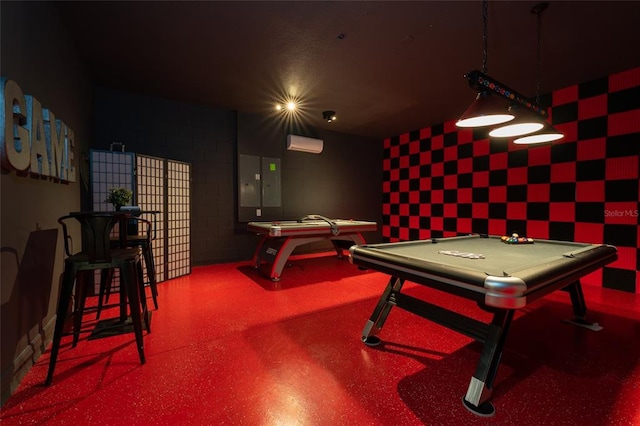 recreation room with billiards and a wall mounted air conditioner