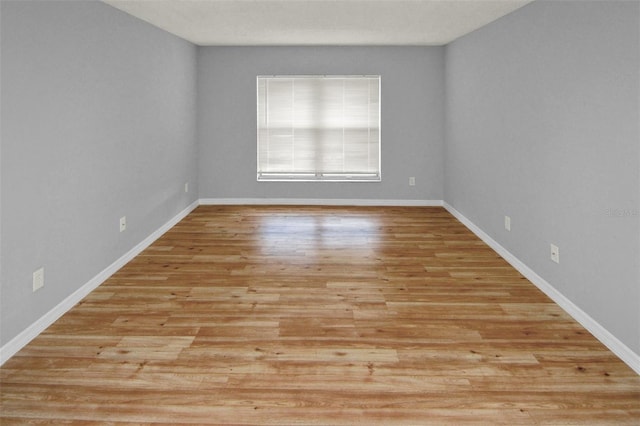 empty room with light wood-type flooring