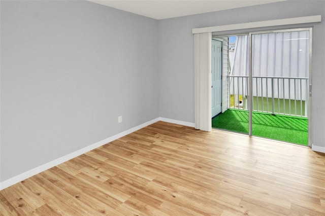 empty room featuring light hardwood / wood-style floors