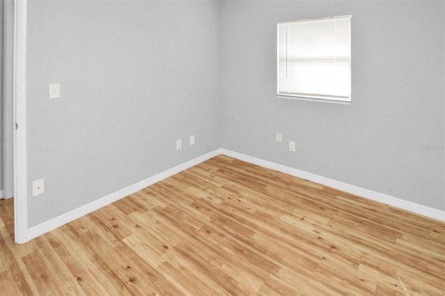 empty room with light wood-type flooring