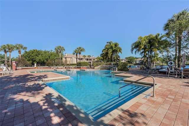 view of pool with a patio area