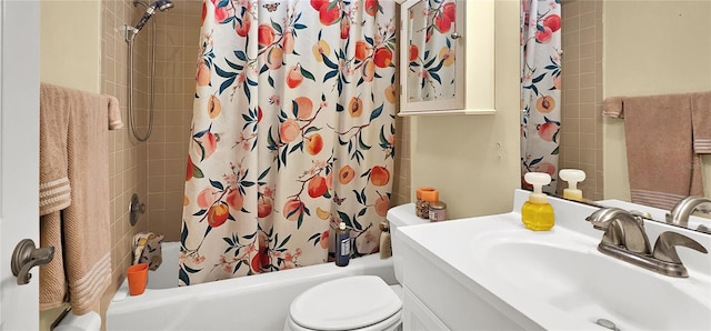 full bathroom with toilet, vanity with extensive cabinet space, and shower / bathtub combination with curtain