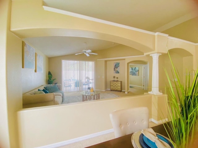 interior space featuring decorative columns and ceiling fan