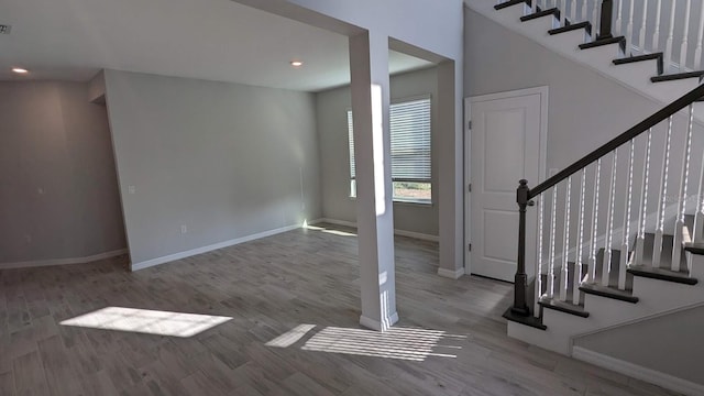 foyer entrance with hardwood / wood-style floors