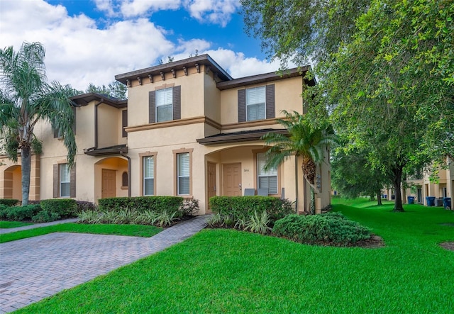 view of front of property with a front lawn