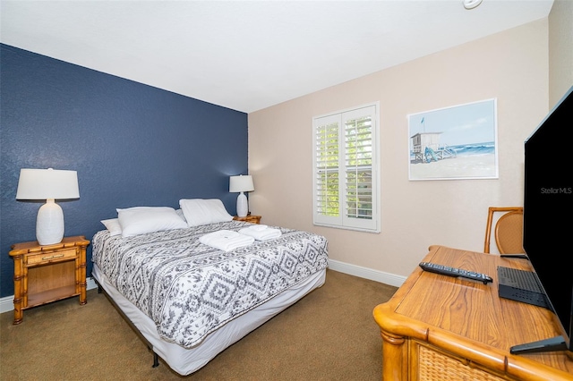 bedroom featuring dark colored carpet