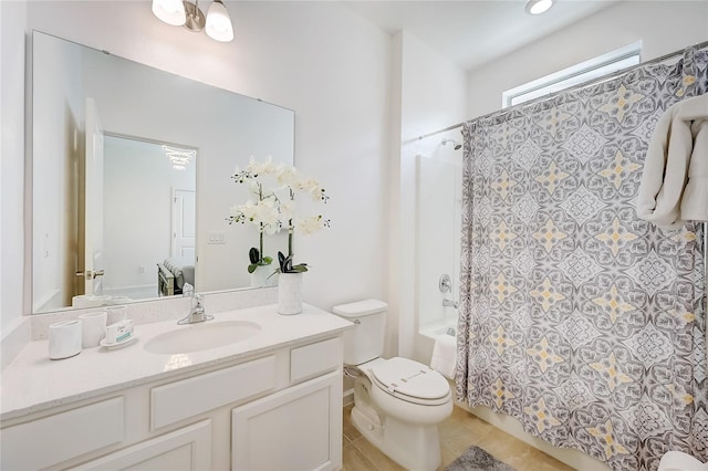 full bathroom featuring toilet, tile patterned floors, shower / bath combo, and vanity