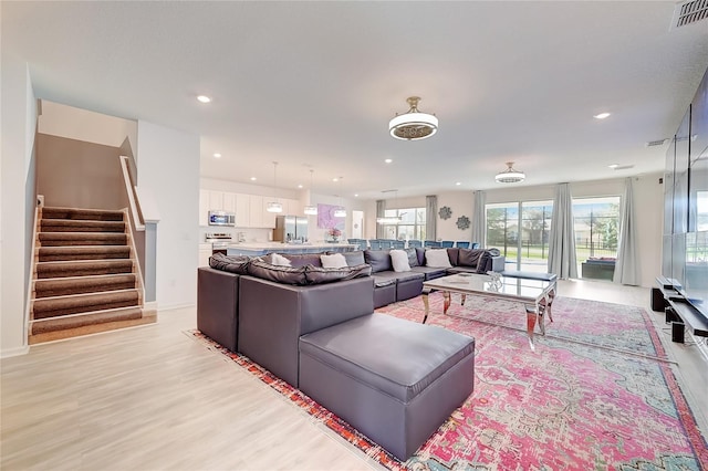 living room featuring light hardwood / wood-style floors