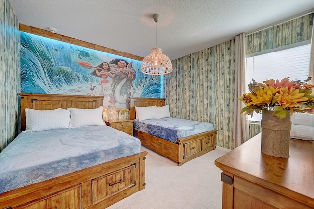 carpeted bedroom featuring a textured ceiling