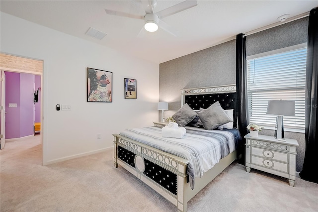 carpeted bedroom featuring ceiling fan