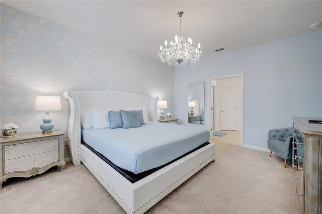 carpeted bedroom with a notable chandelier