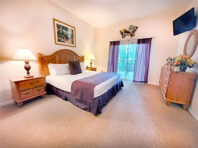 bedroom with light colored carpet and access to outside